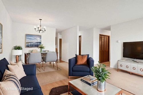 303-239 6 Avenue Ne, Calgary, AB - Indoor Photo Showing Living Room