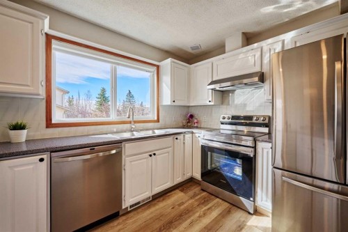 15 Hawkbury Close Nw, Calgary, AB - Indoor Photo Showing Kitchen With Stainless Steel Kitchen