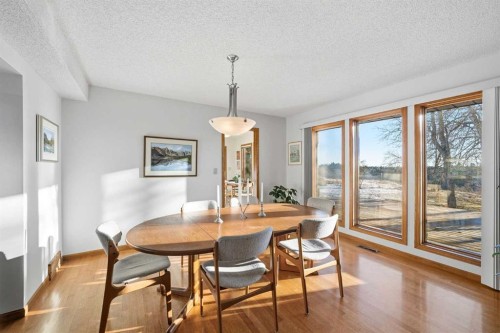 32 Woodgrove Crescent Sw, Calgary, AB - Indoor Photo Showing Dining Room