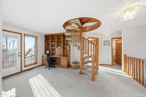 32 Woodgrove Crescent Sw, Calgary, AB - Indoor Photo Showing Other Room