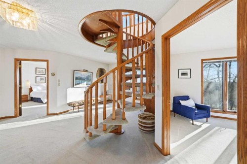 32 Woodgrove Crescent Sw, Calgary, AB - Indoor Photo Showing Other Room