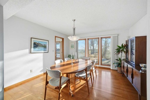 32 Woodgrove Crescent Sw, Calgary, AB - Indoor Photo Showing Dining Room