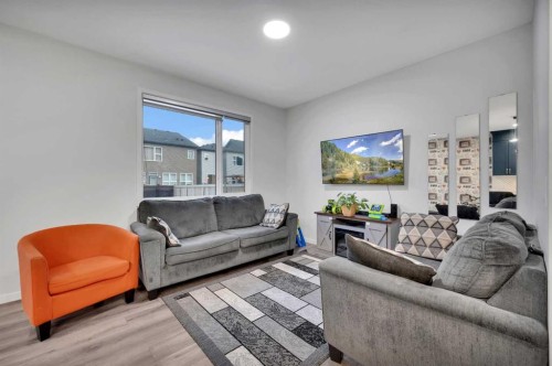 38 Seton Parade Se, Calgary, AB - Indoor Photo Showing Living Room
