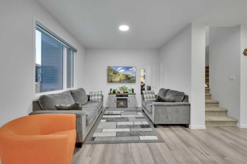 38 Seton Parade Se, Calgary, AB - Indoor Photo Showing Living Room