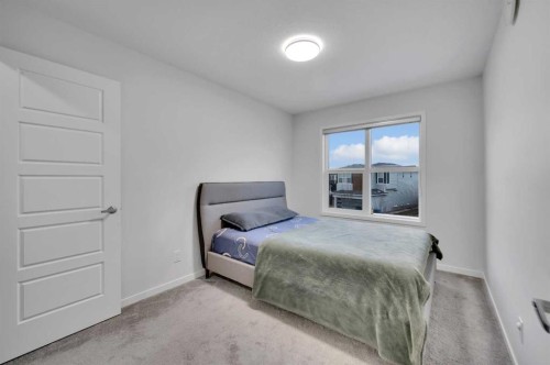 38 Seton Parade Se, Calgary, AB - Indoor Photo Showing Bedroom