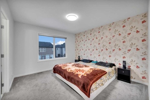 38 Seton Parade Se, Calgary, AB - Indoor Photo Showing Bedroom
