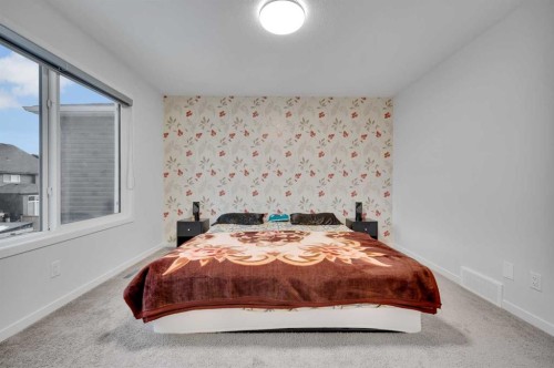 38 Seton Parade Se, Calgary, AB - Indoor Photo Showing Bedroom