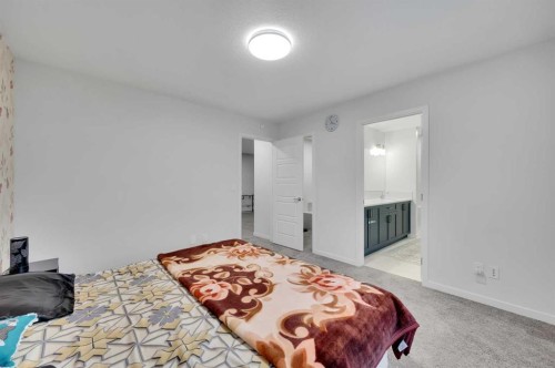 38 Seton Parade Se, Calgary, AB - Indoor Photo Showing Bedroom