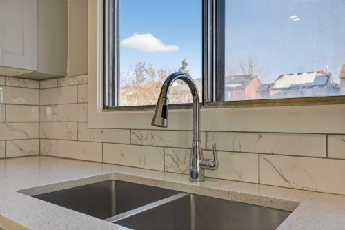 3304 56 Street Ne, Calgary, AB - Indoor Photo Showing Kitchen With Double Sink
