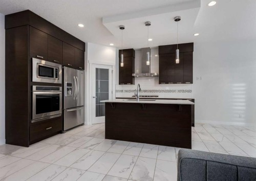 100 Cougar Ridge Close Sw, Calgary, AB - Indoor Photo Showing Kitchen With Stainless Steel Kitchen With Upgraded Kitchen