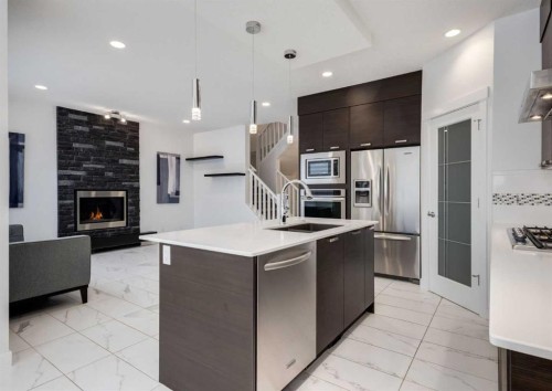100 Cougar Ridge Close Sw, Calgary, AB - Indoor Photo Showing Kitchen With Stainless Steel Kitchen With Upgraded Kitchen