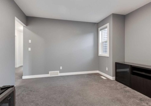 100 Cougar Ridge Close Sw, Calgary, AB - Indoor Photo Showing Other Room