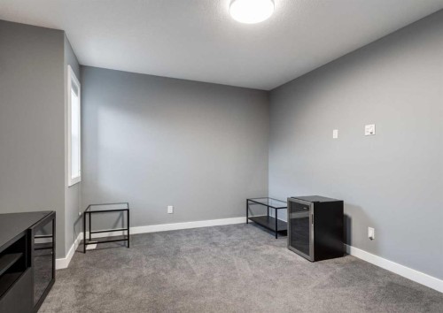 100 Cougar Ridge Close Sw, Calgary, AB - Indoor Photo Showing Other Room