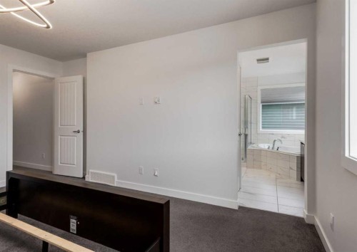 100 Cougar Ridge Close Sw, Calgary, AB - Indoor Photo Showing Other Room