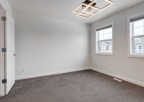 100 Cougar Ridge Close Sw, Calgary, AB - Indoor Photo Showing Other Room