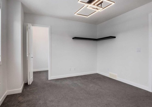 100 Cougar Ridge Close Sw, Calgary, AB - Indoor Photo Showing Other Room