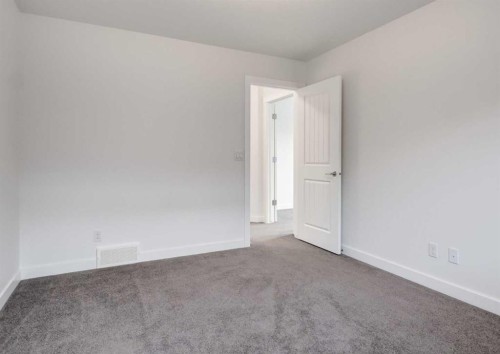 100 Cougar Ridge Close Sw, Calgary, AB - Indoor Photo Showing Other Room