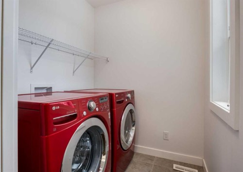 100 Cougar Ridge Close Sw, Calgary, AB - Indoor Photo Showing Laundry Room