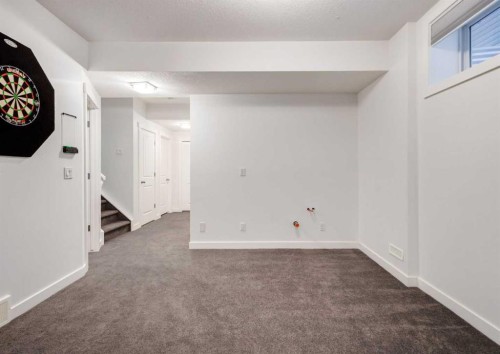 100 Cougar Ridge Close Sw, Calgary, AB - Indoor Photo Showing Other Room