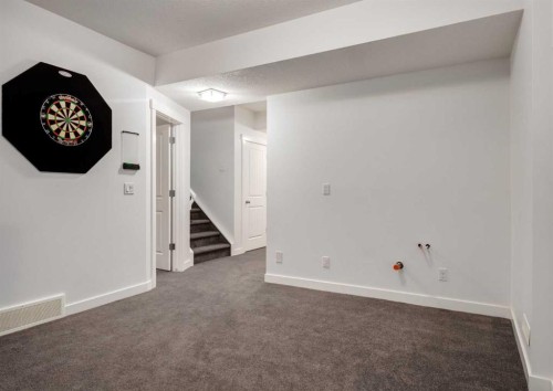 100 Cougar Ridge Close Sw, Calgary, AB - Indoor Photo Showing Other Room