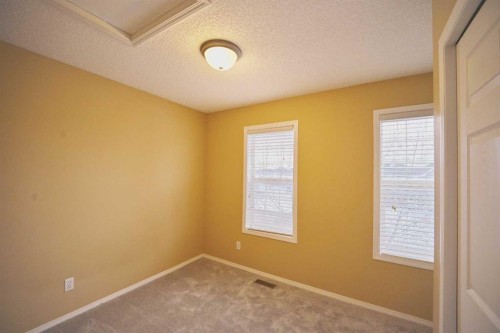 68 Covepark Close Ne, Calgary, AB - Indoor Photo Showing Other Room