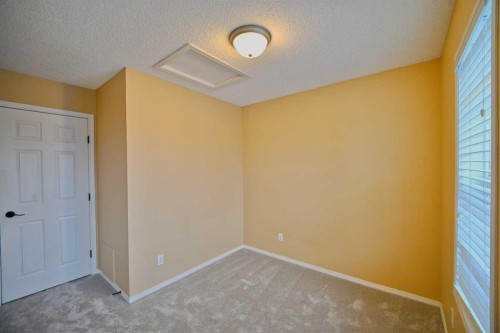 68 Covepark Close Ne, Calgary, AB - Indoor Photo Showing Other Room