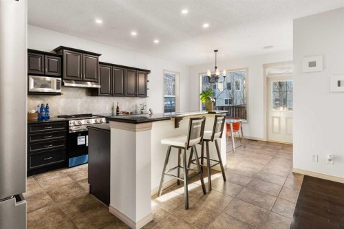 21 Panamount Row Nw, Calgary, AB - Indoor Photo Showing Kitchen With Upgraded Kitchen