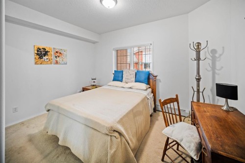 201-223 Tuscany Springs Boulevard Nw, Calgary, AB - Indoor Photo Showing Bedroom