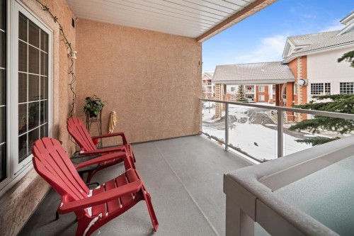 201-223 Tuscany Springs Boulevard Nw, Calgary, AB - Outdoor With Balcony With Exterior