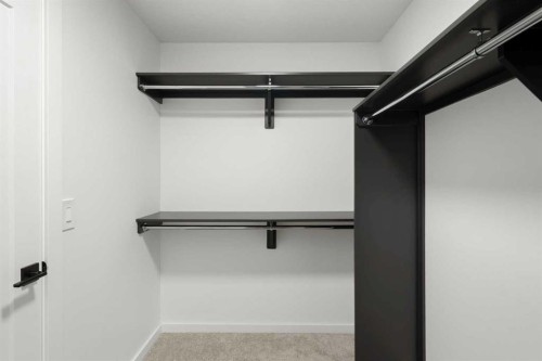 296 Spring Creek Circle Sw, Calgary, AB - Indoor With Storage