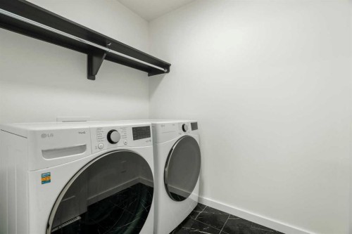296 Spring Creek Circle Sw, Calgary, AB - Indoor Photo Showing Laundry Room