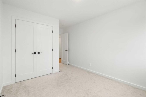 296 Spring Creek Circle Sw, Calgary, AB - Indoor Photo Showing Other Room