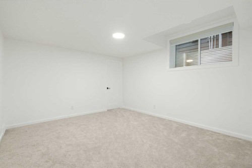296 Spring Creek Circle Sw, Calgary, AB - Indoor Photo Showing Other Room