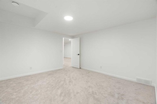 296 Spring Creek Circle Sw, Calgary, AB - Indoor Photo Showing Other Room
