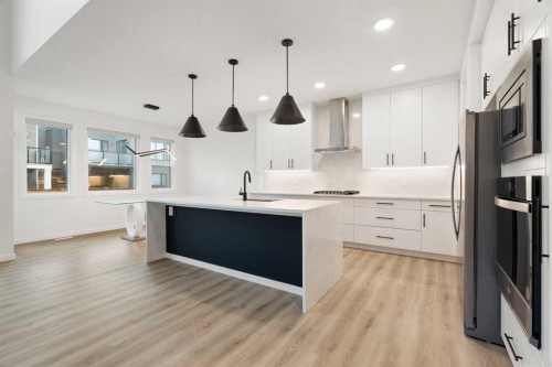 296 Spring Creek Circle Sw, Calgary, AB - Indoor Photo Showing Kitchen With Upgraded Kitchen