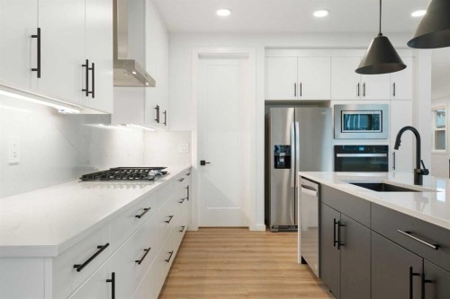 296 Spring Creek Circle Sw, Calgary, AB - Indoor Photo Showing Kitchen With Upgraded Kitchen