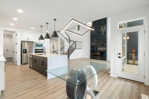 296 Spring Creek Circle Sw, Calgary, AB - Indoor Photo Showing Kitchen With Upgraded Kitchen