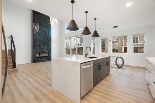 296 Spring Creek Circle Sw, Calgary, AB - Indoor Photo Showing Kitchen With Upgraded Kitchen