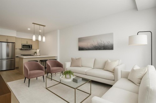 606-8880 Horton Road Sw, Calgary, AB - Indoor Photo Showing Living Room