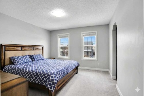 9214 Saddlebrook Drive Ne, Calgary, AB - Indoor Photo Showing Bedroom