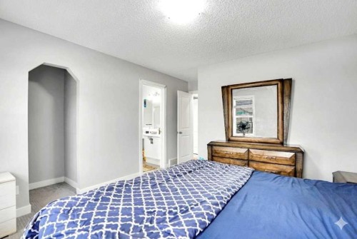 9214 Saddlebrook Drive Ne, Calgary, AB - Indoor Photo Showing Bedroom