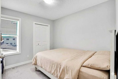 9214 Saddlebrook Drive Ne, Calgary, AB - Indoor Photo Showing Bedroom