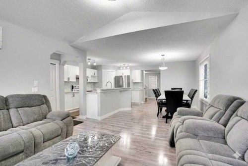 9214 Saddlebrook Drive Ne, Calgary, AB - Indoor Photo Showing Living Room