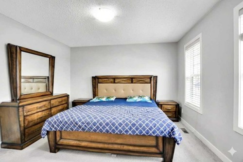 9214 Saddlebrook Drive Ne, Calgary, AB - Indoor Photo Showing Bedroom