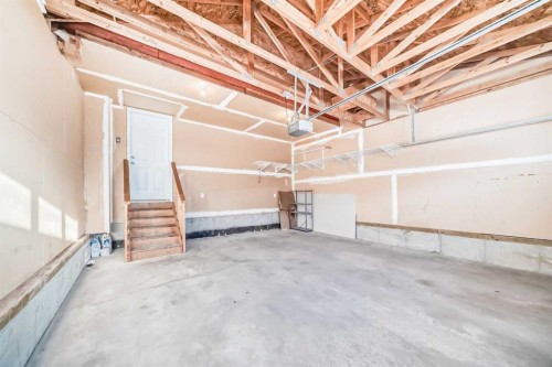 120 Springmere Grove, Chestermere, AB - Indoor Photo Showing Garage