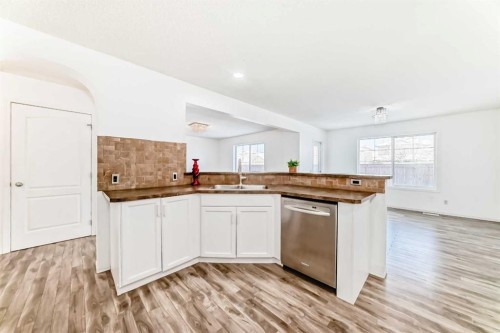 120 Springmere Grove, Chestermere, AB - Indoor Photo Showing Kitchen With Double Sink