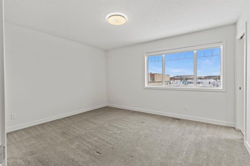 128 Fireside Way, Cochrane, AB - Indoor Photo Showing Other Room