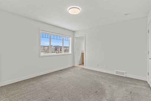 128 Fireside Way, Cochrane, AB - Indoor Photo Showing Other Room