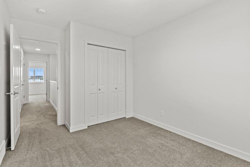 128 Fireside Way, Cochrane, AB - Indoor Photo Showing Other Room