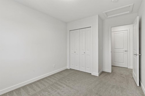 128 Fireside Way, Cochrane, AB - Indoor Photo Showing Other Room